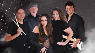 Casanova and The Divas band group photo. 5 members standing together posing.