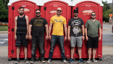 My so called 90s band group photo with members standing together in a line