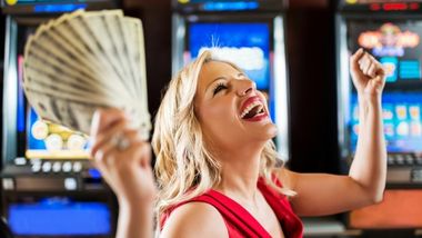 Girl with money celebrating.