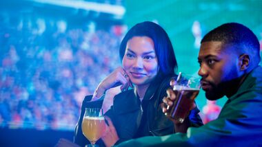 Man and woman having drinks