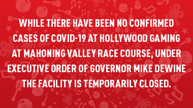 red swirl with text, "While there have been no confirmed cases of COVID-19 at Hollywood Gaming at Mahoning Valley Race Course under Executive Order of Governor Mike DeWine the facility is temporarily closed."